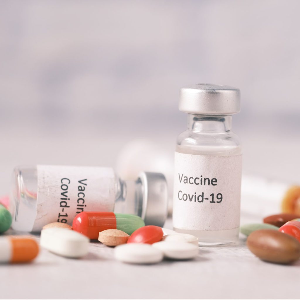 an image which shows a mix of medication and vaccines