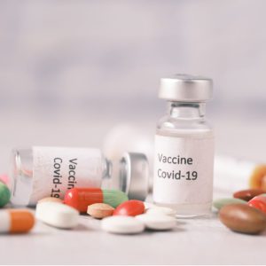 an image which shows a mix of medication and vaccines