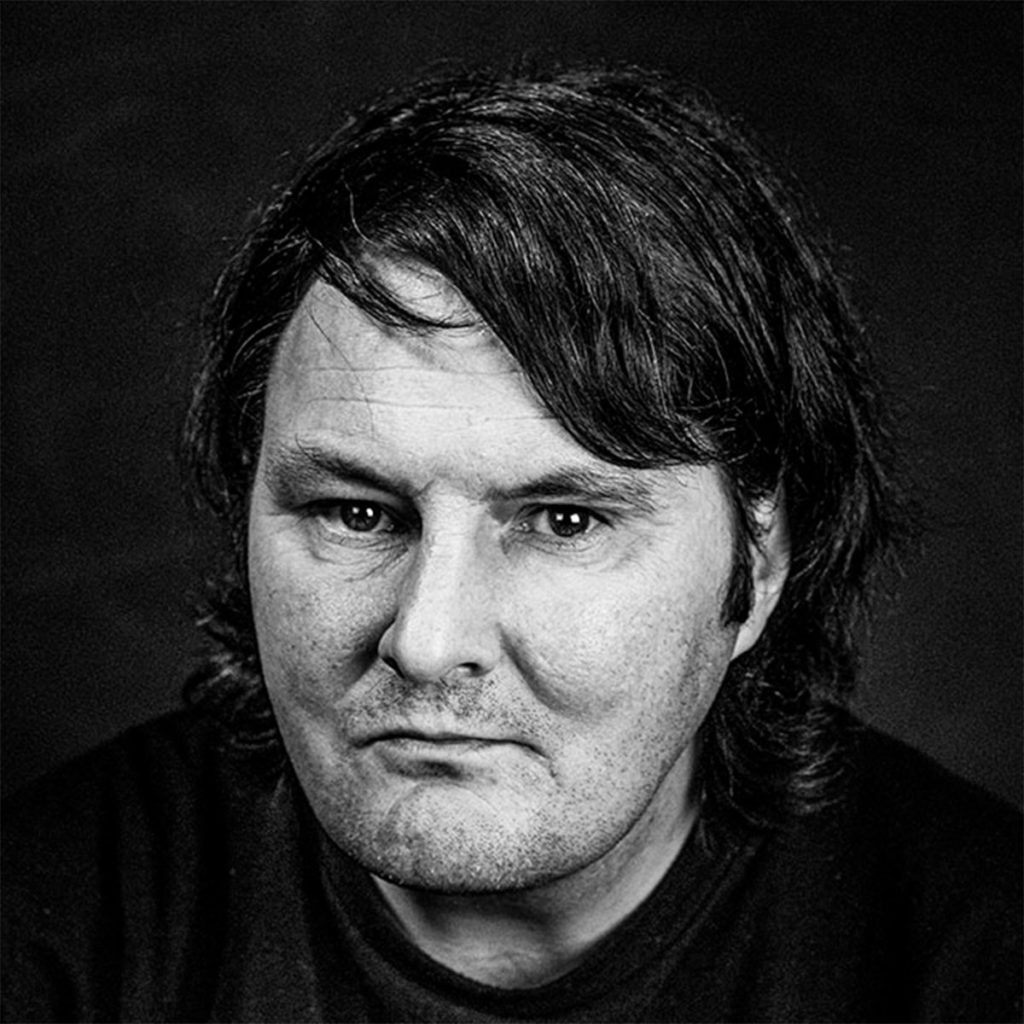 portrait black and white photo of John