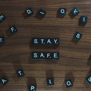 scrabble letters spelling out 'stay safe'